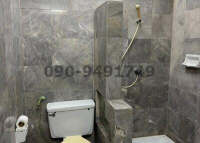 Modern bathroom with grey tile design