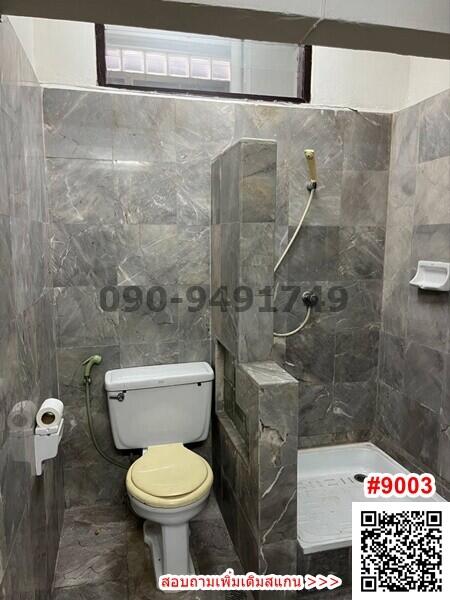 Modern bathroom with grey tile design