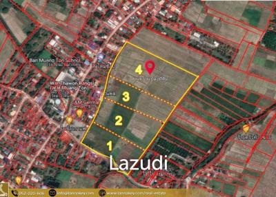 Selling a large plot of land next to the village.