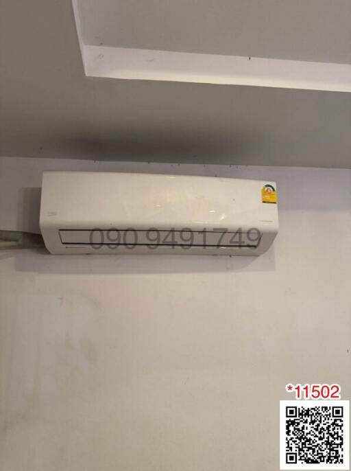 Wall-mounted air conditioner in a modern room