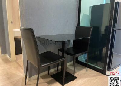 Modern dining area with table and chairs