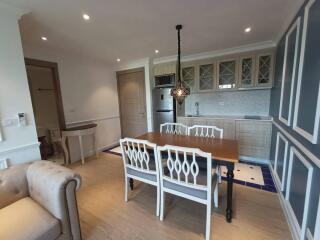 Modern kitchen with dining area and elegant furnishings