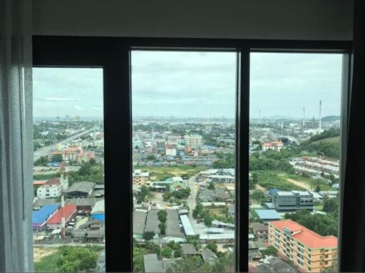 Panoramic city view from high-rise apartment window