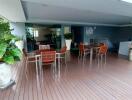 Spacious covered patio area with seating and modern amenities