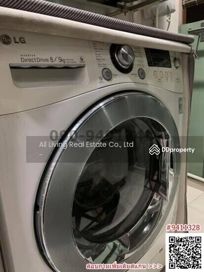 Modern LG washing machine in a home laundry room