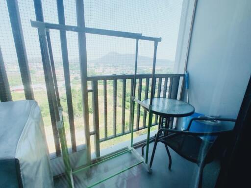 Cozy furnished balcony with scenic mountain view