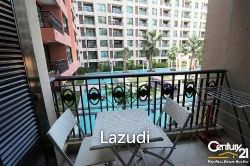 1 Bed Condo with Pool View in Town