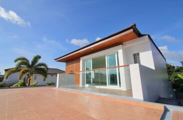 Modern house with large windows and spacious terrace