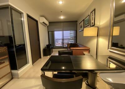 Spacious and modern living room with a view of the city