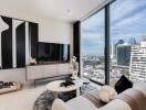 Modern apartment living room with large windows and city view