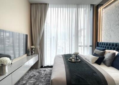 Elegant bedroom with luxurious decor and modern amenities