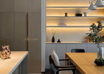 Modern dining area with elegant lighting and stylish decor