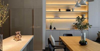Modern dining area with elegant lighting and stylish decor