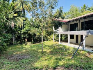 Peaceful house with spacious yard and mature trees