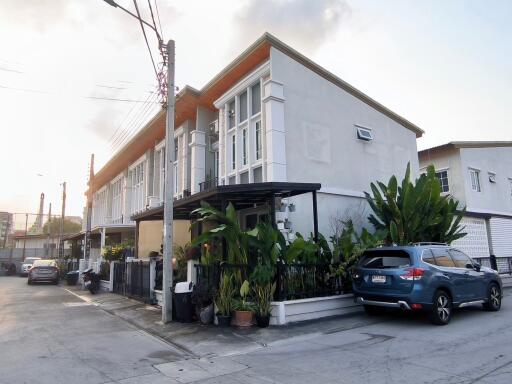 Modern two-story residential building on a city street