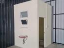 Modular freestanding unit inside a warehouse with exterior sink