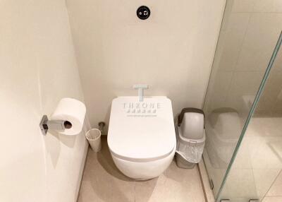 Modern bathroom with white ceramic toilet and sleek design