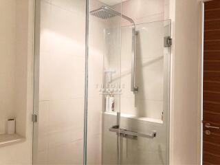 Modern bathroom with glass shower enclosure