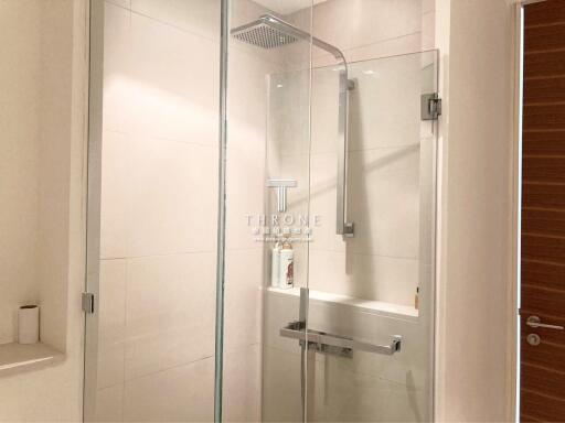 Modern bathroom with glass shower enclosure