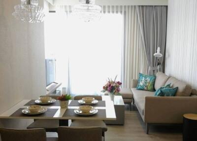 Elegant living room with dining area and comfortable seating