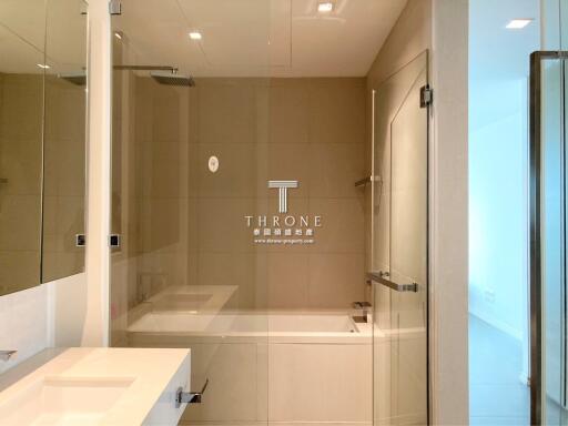 Modern bathroom with spacious glass shower and elegant decor