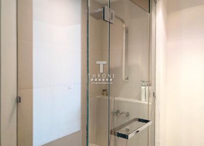 Modern bathroom interior with glass shower and elegant design