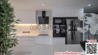 Modern kitchen with sleek design and advanced appliances