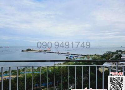 Spacious balcony with panoramic sea view and QR code for contact