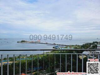 Spacious balcony with panoramic sea view and QR code for contact