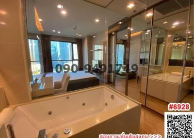 Modern bathroom with jacuzzi tub and city view