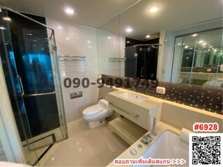 Modern bathroom interior with glass shower enclosure and sleek design