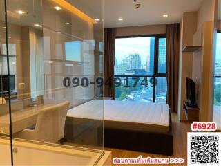 Modern bedroom with city view and glass partition