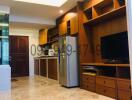 Modern kitchen with custom cabinetry and built-in appliances