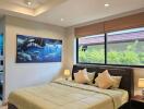 Modern bedroom with large bed and artistic decor