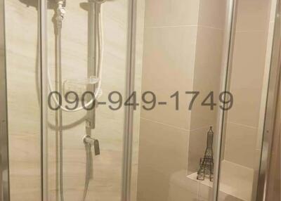 Modern bathroom with glass shower enclosure