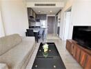 Modern living room with kitchen view in a contemporary apartment