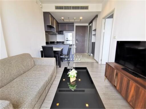 Modern living room with kitchen view in a contemporary apartment