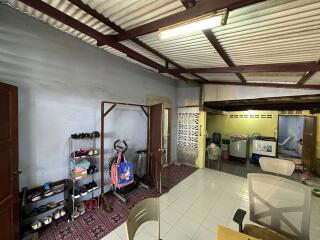 Spacious garage with storage and workspace areas