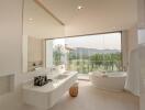 Spacious modern bathroom with large windows and scenic view