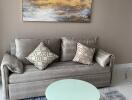 Elegant living room with modern sofa and artistic decor