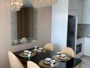 Elegant dining area with modern furniture and decorative lighting