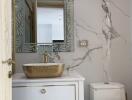 Modern bathroom with decorative patterns and marble walls
