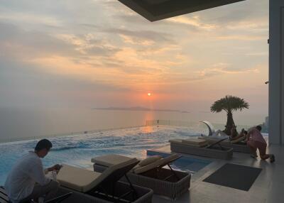 Luxurious outdoor swimming pool overlooking the sunset