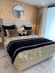 Luxurious modern bedroom with elegant decor and abundant natural light