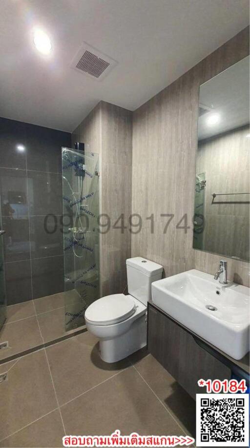 Modern Bathroom with Glass Shower and Elegant Sink
