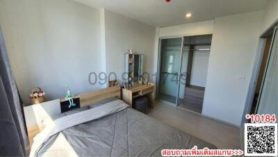 Spacious modern bedroom with direct access to balcony