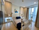Bright and well-furnished master bedroom with city view