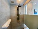 Modern bathroom with spacious walk-in shower and sleek fixtures