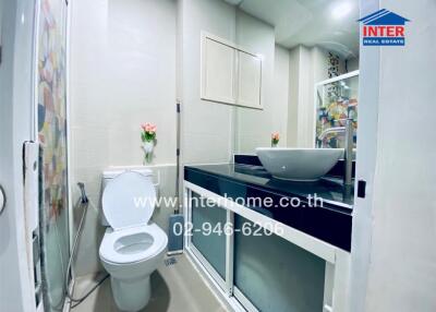 Modern compact bathroom with stylish fixtures