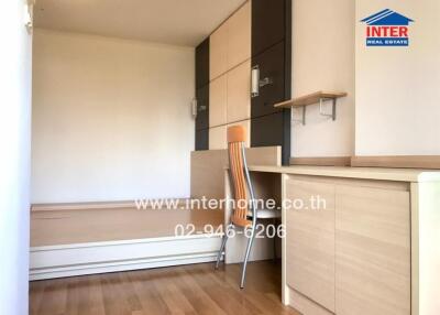 Spacious bedroom with built-in wardrobes and ample natural light